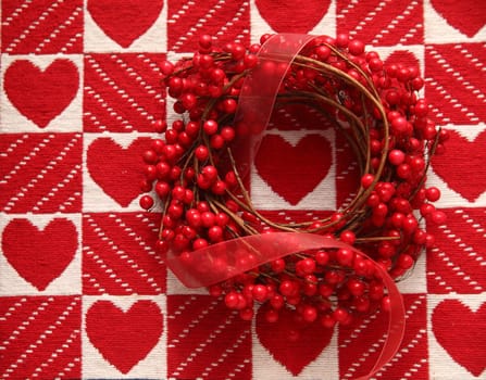 wreath with red berries and hearts
