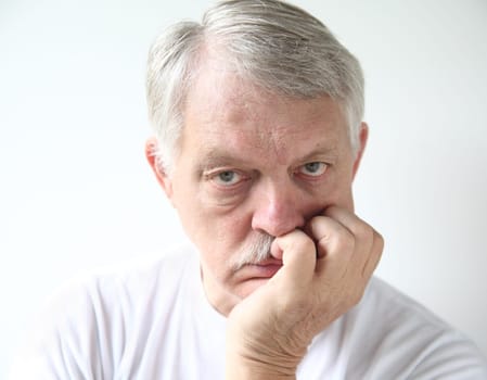 man with bored expression