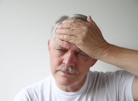 man has a headache
