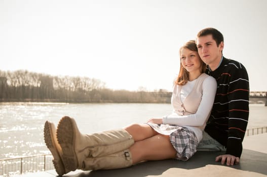 Young happy couple together  - outdoor lifestyle portrait
