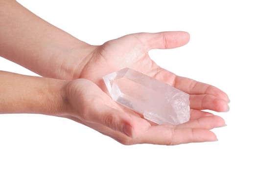 Hands holding quartz - emiprecious gems are used in esoteric and alternative medicine