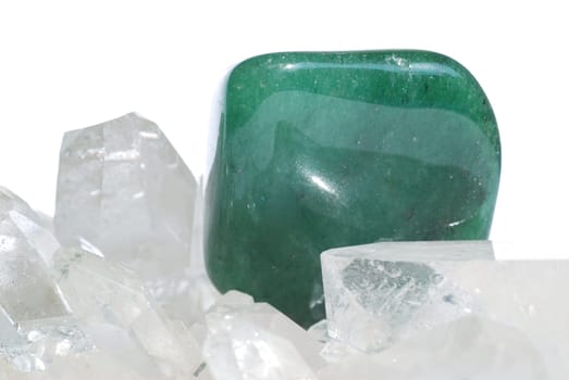 Aventurine gem laid on quartz crystals