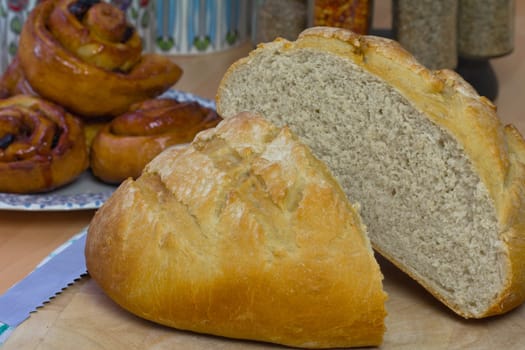 A loaf of bread freshly baked and cut in half