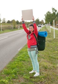 Hitchhiker with sign