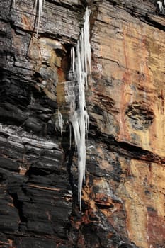 icicles on a cliff face in ballybunion ireland on a winters day
