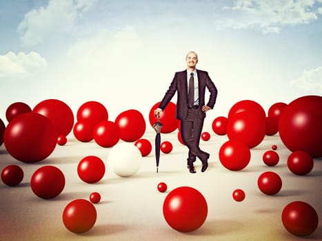 standing man and lots of red sphere