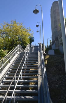 A long metal stairwell over several sections in the city of Hamilton.