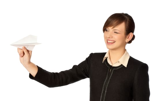 Businesswoman throwing white paper plane on the break