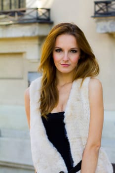 Young, beautiful woman in the city park