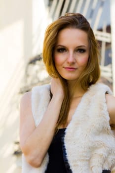 Young, beautiful woman in the city park