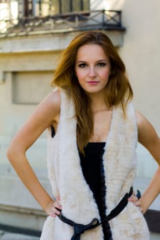 Young, beautiful woman in the city park