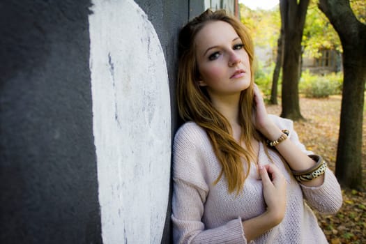 Young, beautiful woman in the city park