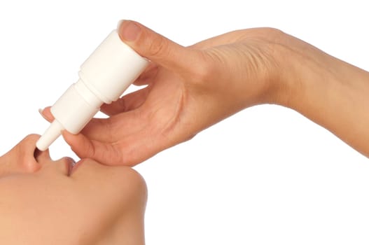 The woman drips drops for a nose for fast recover