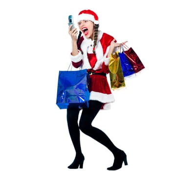 one woman dressed as santa claus carrying screaming on the telephone christmas bags  on studio isolated white background