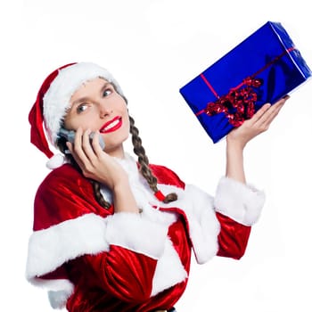 one woman dressed as santa claus holding christmas presents gifts on the telephone studio isolated white background