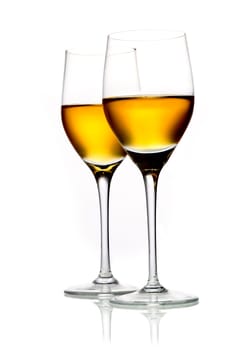 Two glasses of sherry isolated on white