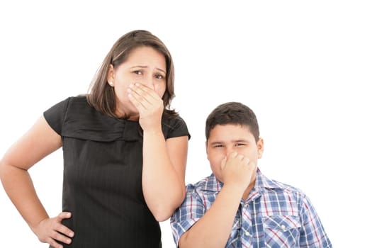 Covering them nose after a bad smell
