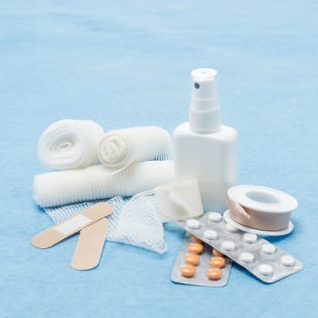 Content of First aid kit plasters, bandage and pills