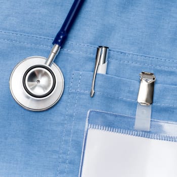 Doctor ID name tag on lab coat with stethoscope