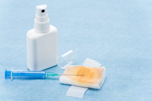 Waste after a flu shot on blue background