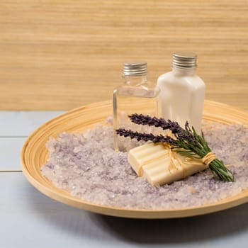 Natural spa products lavender on wooden tray