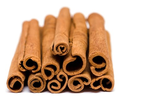 Cinnamon sticks on white background
