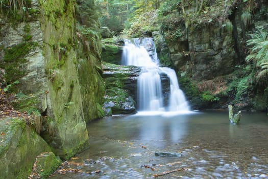 Waterfall in the forest in the forest (Czech Republic)