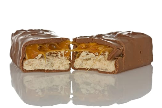 Chocolate bar with reflection on a white background