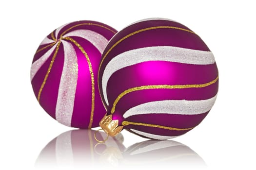 purple christmas baubles with reflection on white background
