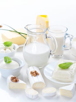 Assortment of dairy products on white background
