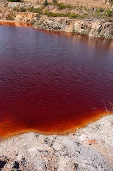 Polluted water pond in the abandoned mine of Lousal, Grandola, Portugal