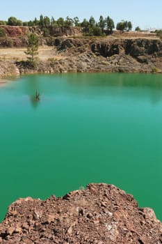 Polluted water pond in the abandoned mine of Lousal, Grandola, Portugal
