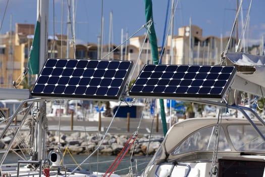 Photovoltaic panels on a sailboat in the port of Gruissan in the south of France