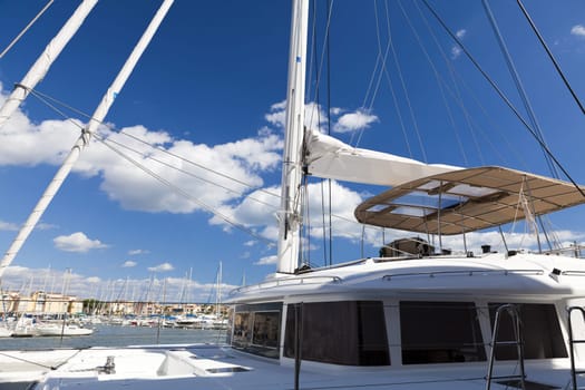 Detail of a modern catamaran sailing yacht in the port of Gruissan in the south of France