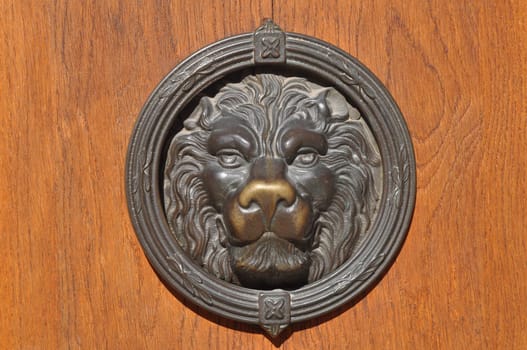 Detail of an ancient Venetian mask in the city of Venice (Venezia) in Italy