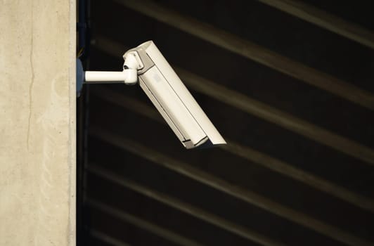 Overhead security camera in heavily guarded industrial area
