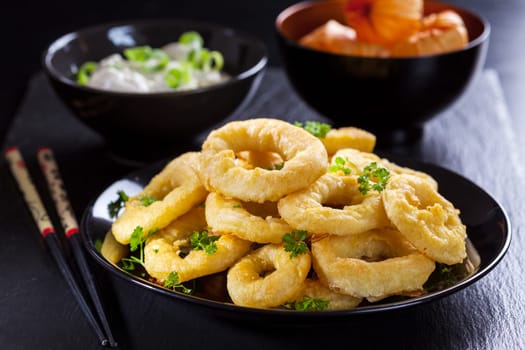 Calamari rings with yogurt garlic dip