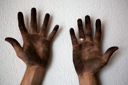 black dirty man hands open palms on white background
