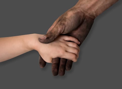 black dirty man hands holding kid clean hand concept