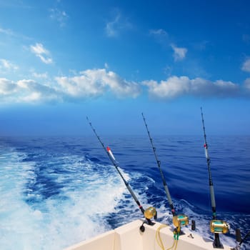 boat fishing trolling in deep blue ocean offshore in Mediterranean sea