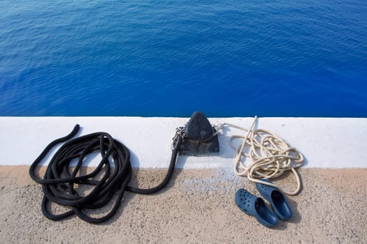 Boat noray marine rope and shoes in marina port