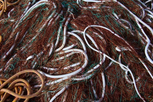 fishing nets pattern mess stacked at port in Mediterranean