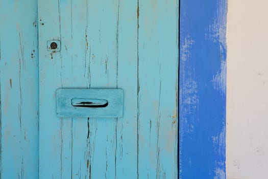 Blue and turquoise mediterranean door in Ibiza formentera