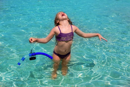 aqua water beach and open arms bikini little kid girl
