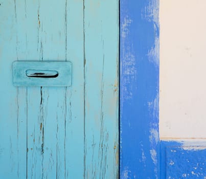 Blue and turquoise mediterranean door in Ibiza formentera