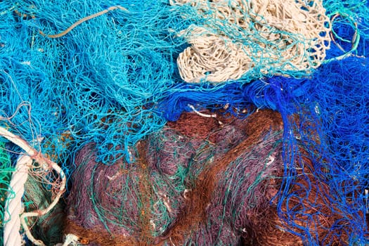 fishing nets pattern mess stacked at port in Mediterranean