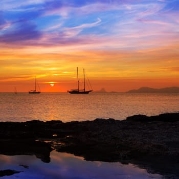 colorful sunset of Ibiza view from formentera with Es Vedra