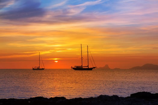colorful sunset of Ibiza view from formentera with Es Vedra