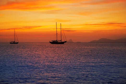colorful sunset of Ibiza view from formentera with Es Vedra