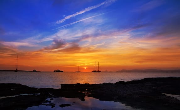 colorful sunset of Ibiza view from formentera with Es Vedra